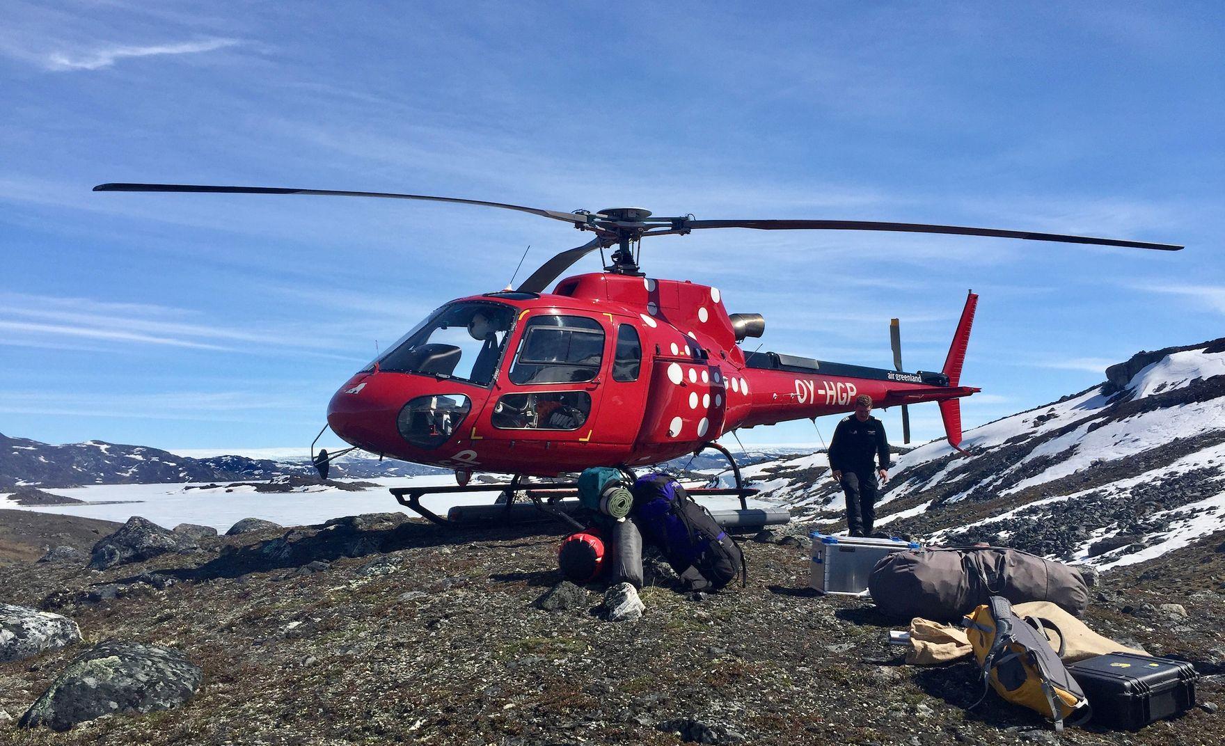 Helicopter on landing zone in Greenland