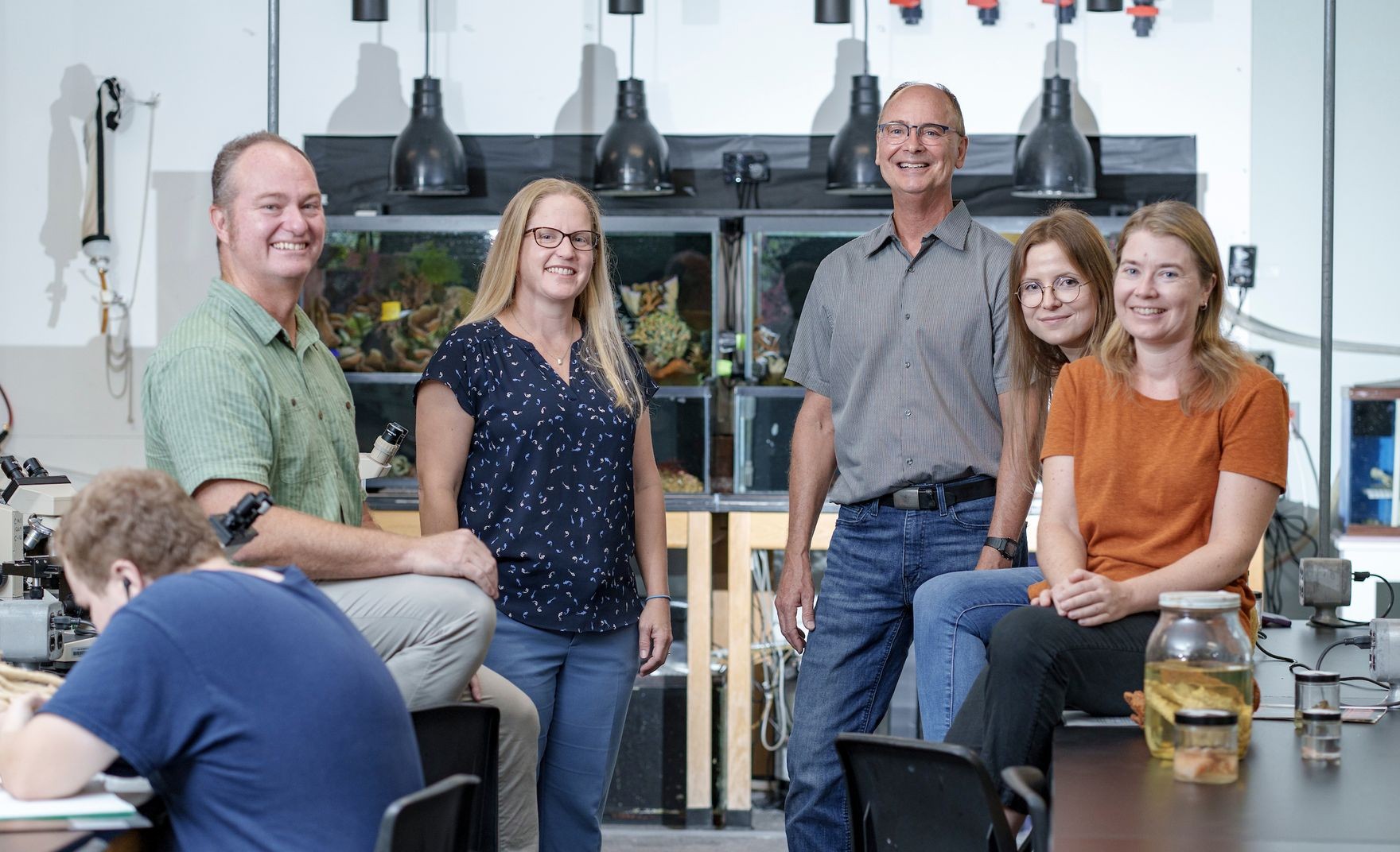 Sea Sponge team pose for picture in lab