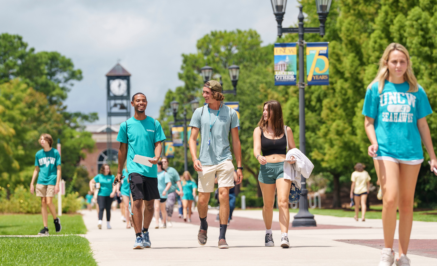 Students walk through campus in Spring