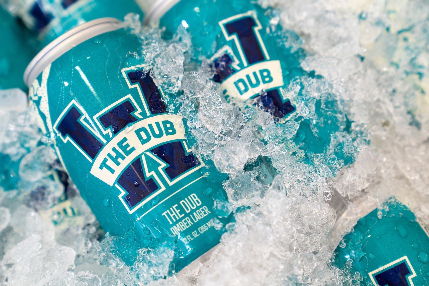 The Dub Amber Lager cans on ice