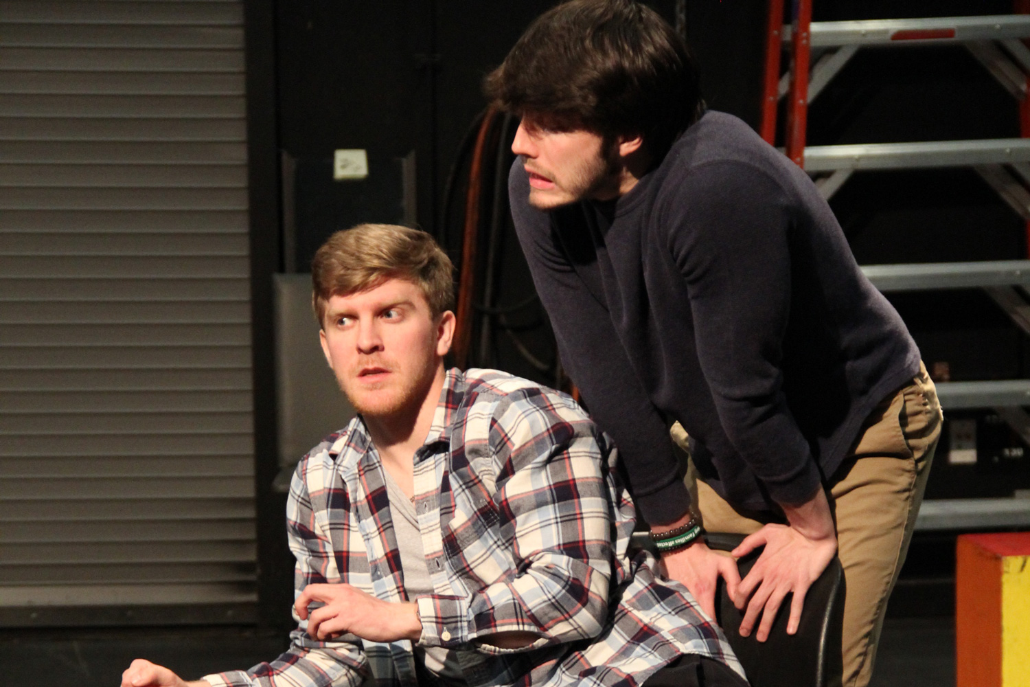 Two student actors on stage