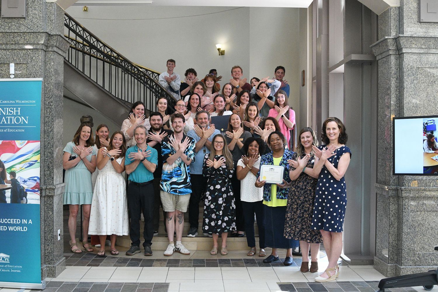 Watson College Dean Tracy Linderholm, faculty and students enrolled in WCE’s Secondary Education programs
