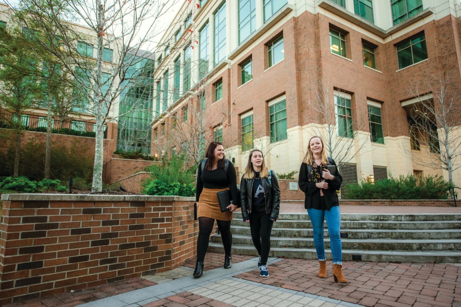 3 girls walking outside