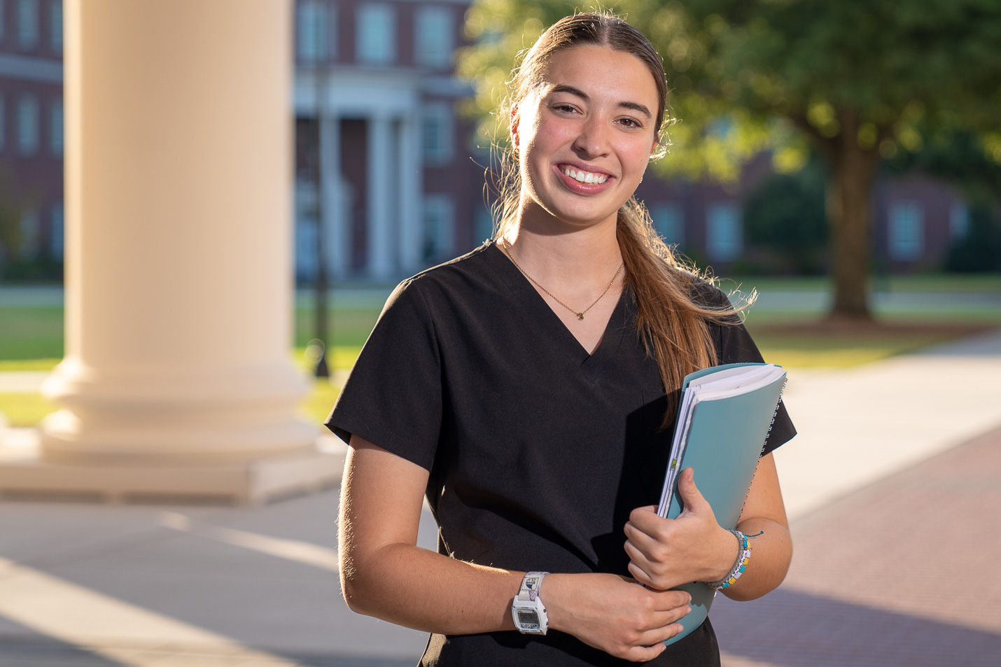 Anna Vreeling ’25, a UNCW clinical research student, is committed to finding a cure for ovarian cancer, inspired by her mother's battle with the disease.