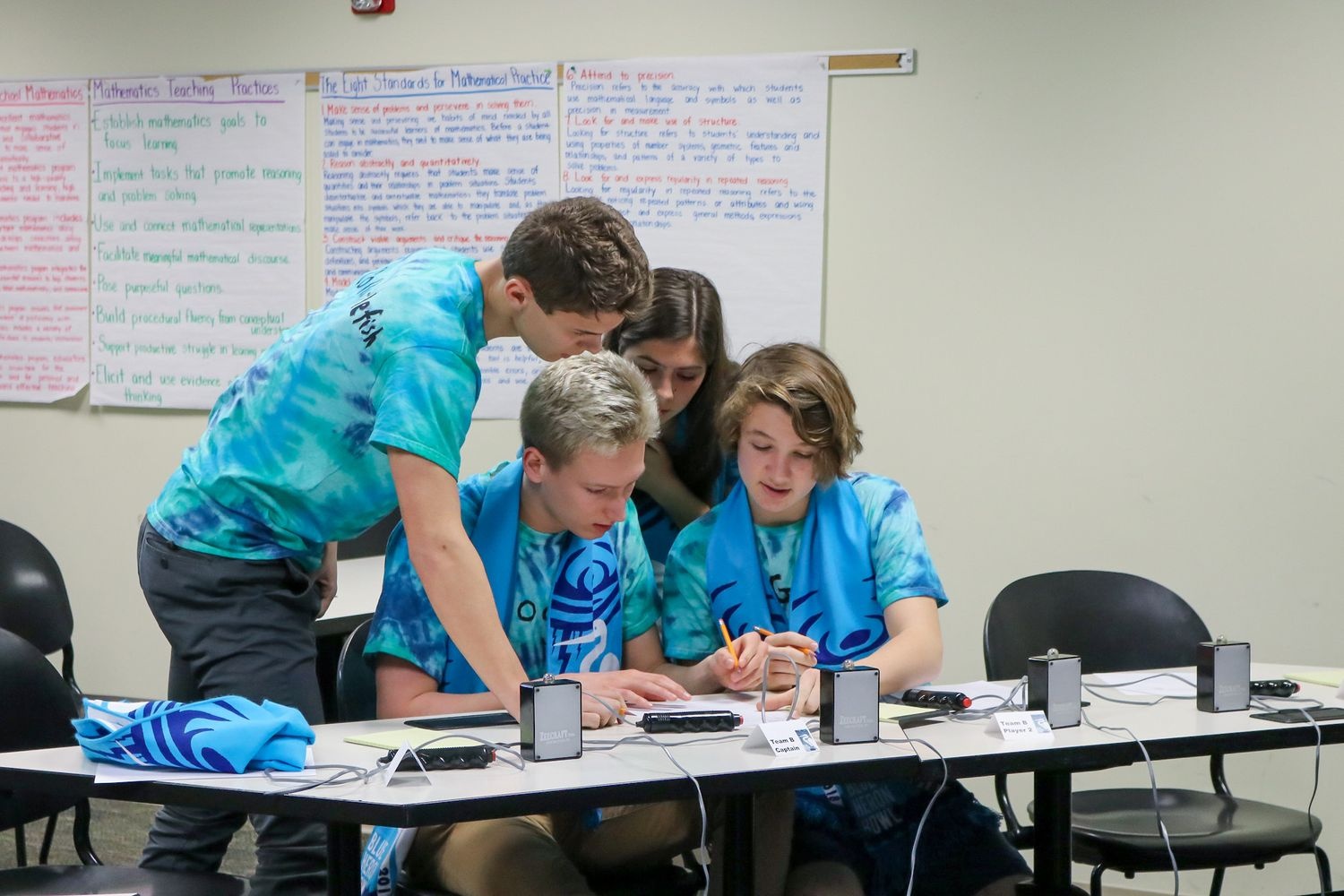 Three students working together