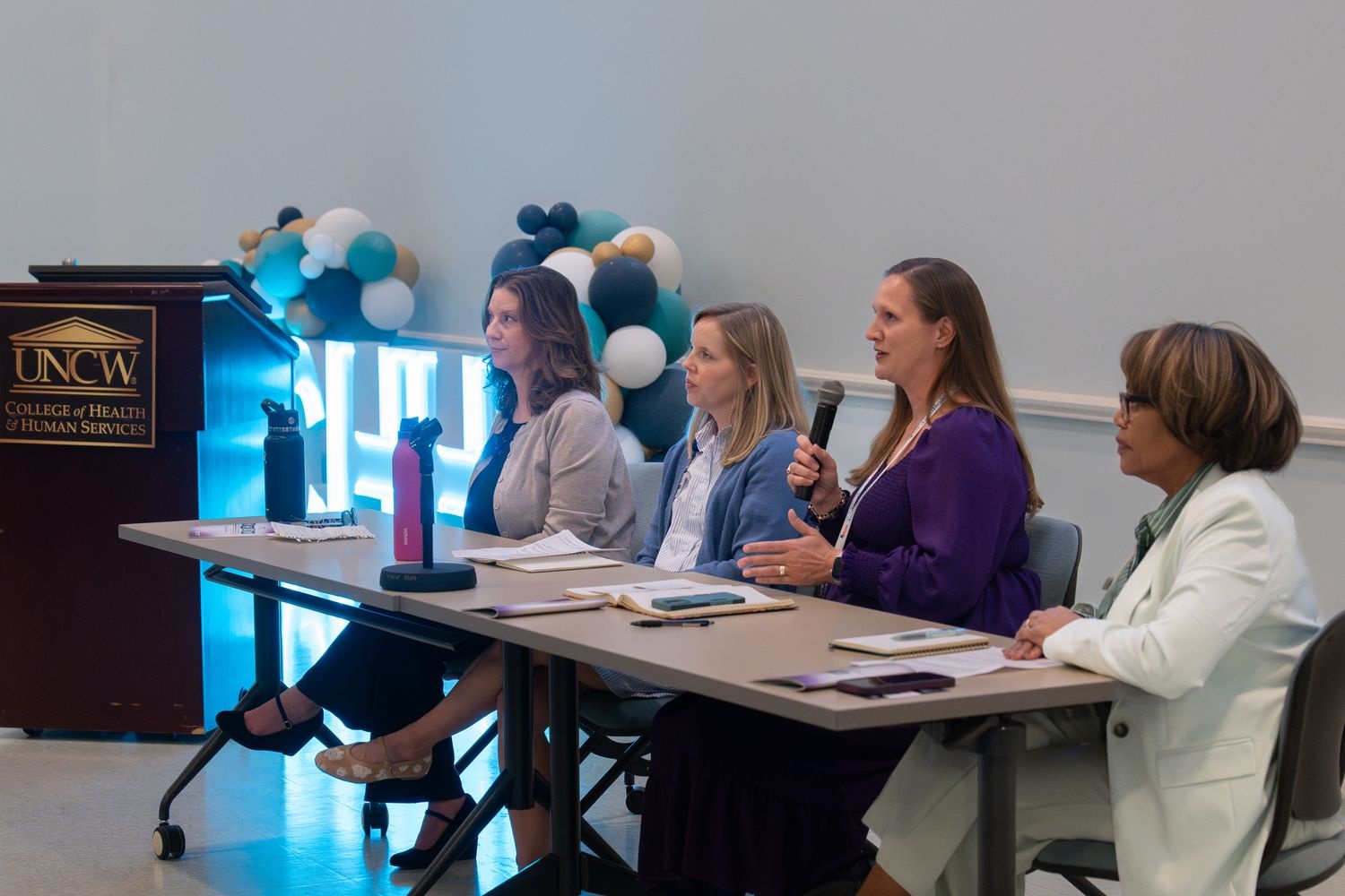 A panel discussion featuring leading health experts Kim Gore, Casey Merritt, Sarah Ridout, April Parker, and Megan Rose.
