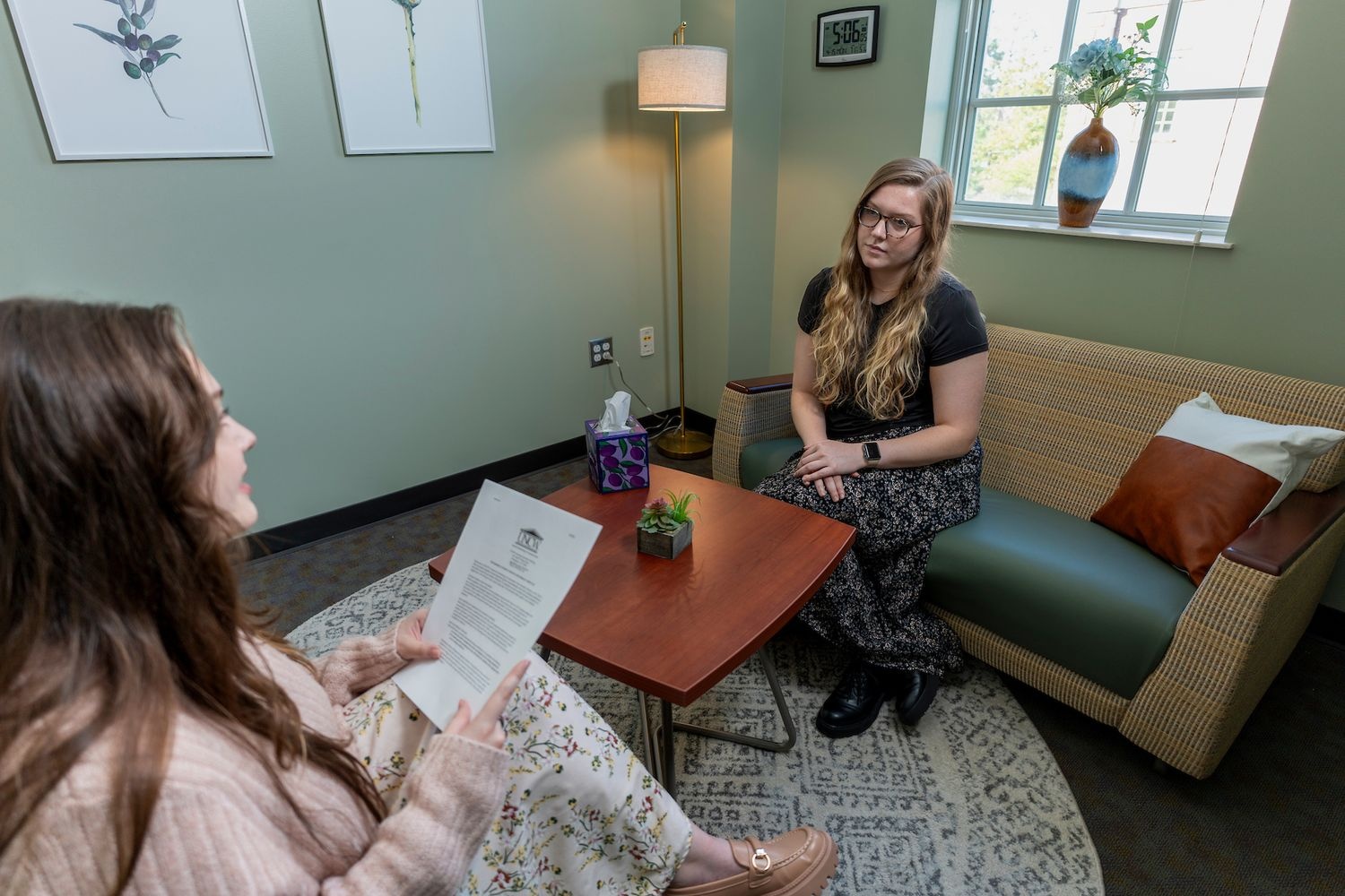Two people speaking in a GPAC therapy room