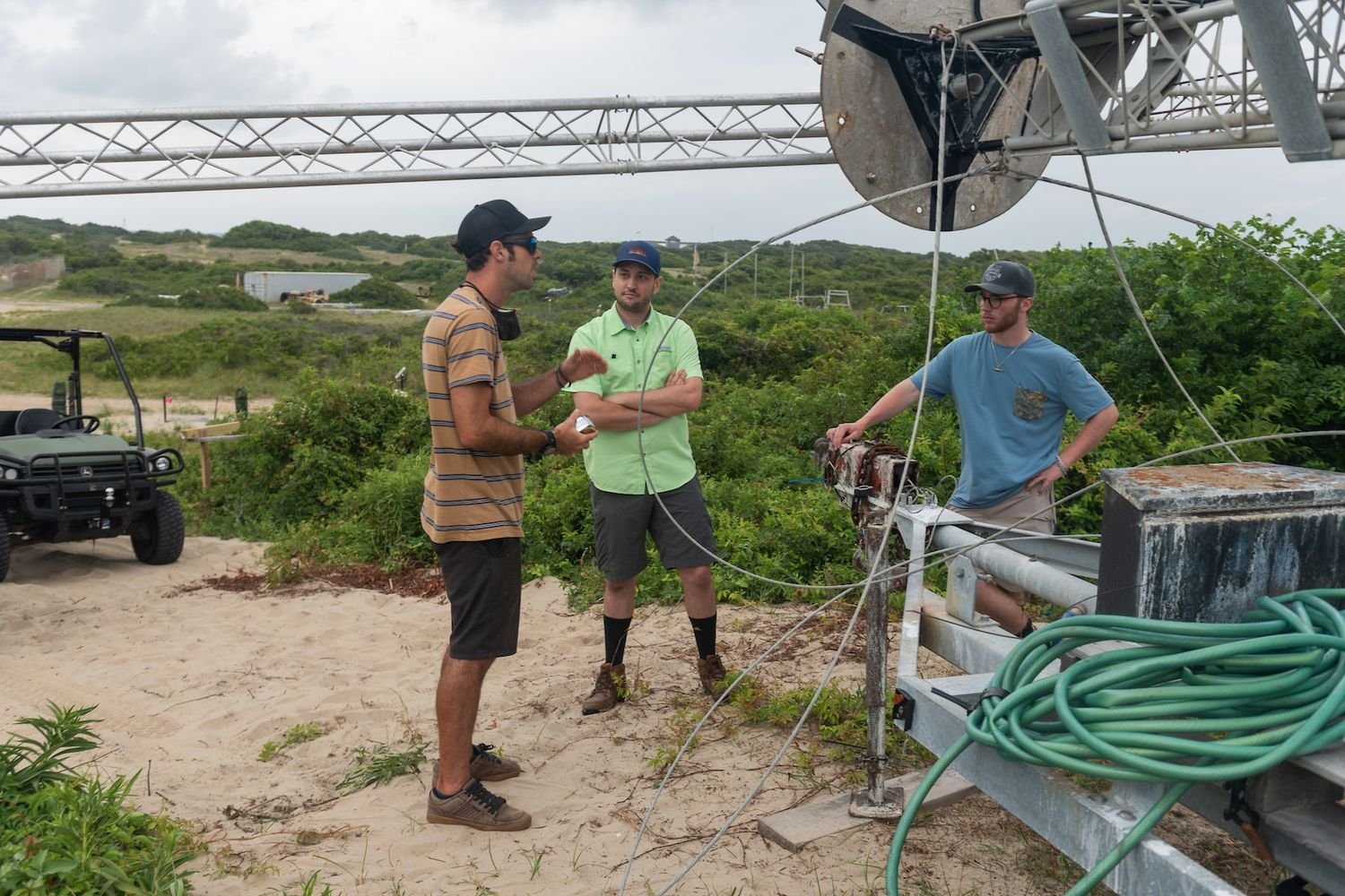 (Dr. Ryan Mieras & Coastal Engineering Student Tanner Jernigan at the US Army Corps of Engineers Field Research Facility (FRF) in Duck, NC on August 2-3, 2021 installing and testing LiDAR technology used to measure waves and coastal change during storm impact)