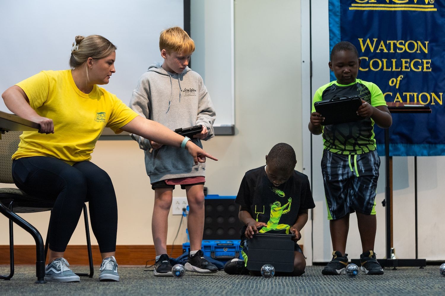Junior Seahawk Academy session for two youths to learn about and interact with Sphero Robots