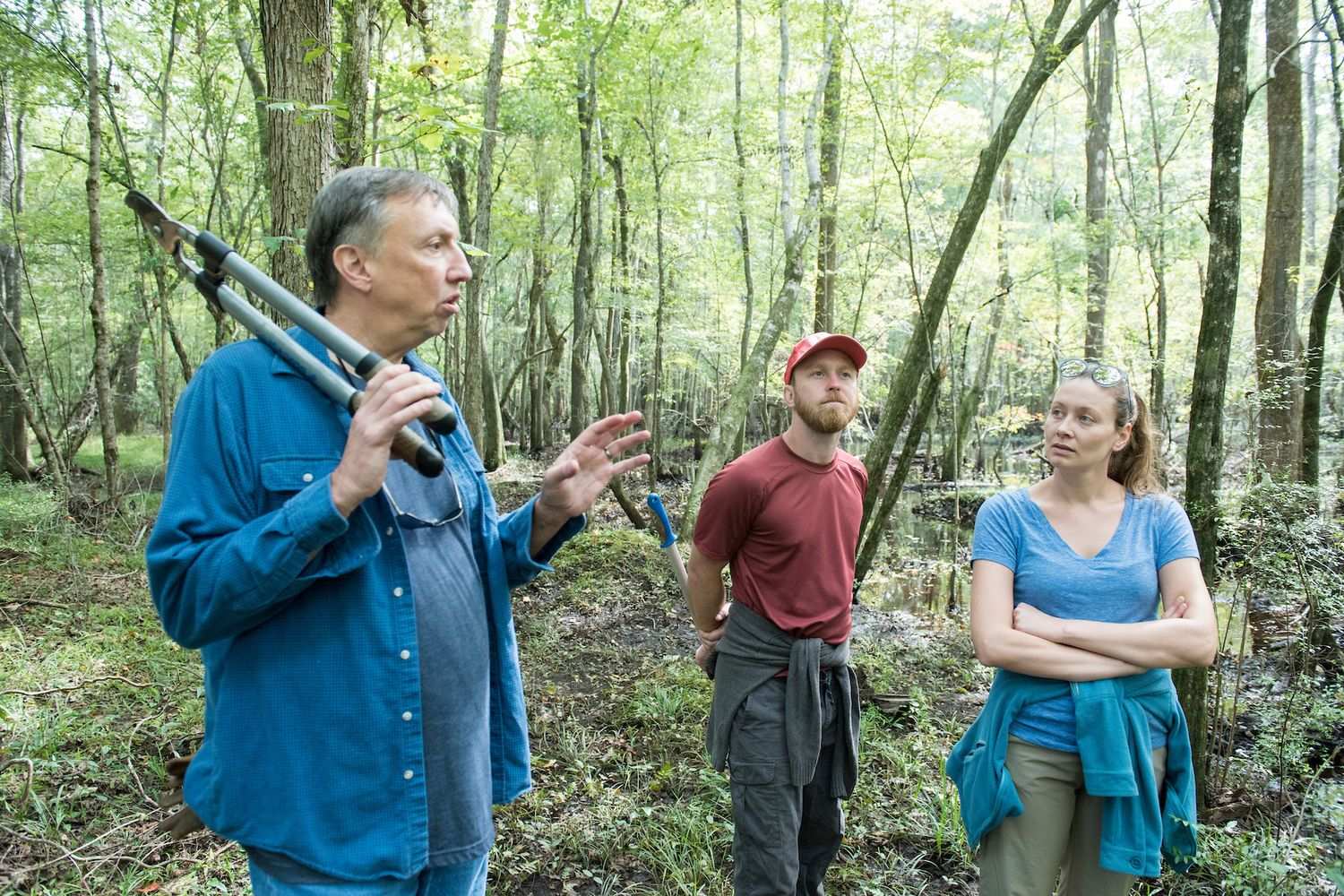 Graduate students with Environmental Science faculty help clear trails at EV-Henwood Nature Preserve