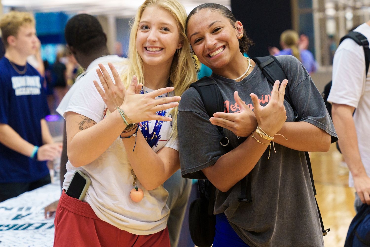 Students giving Wings Up salute while at Rock the Rec.