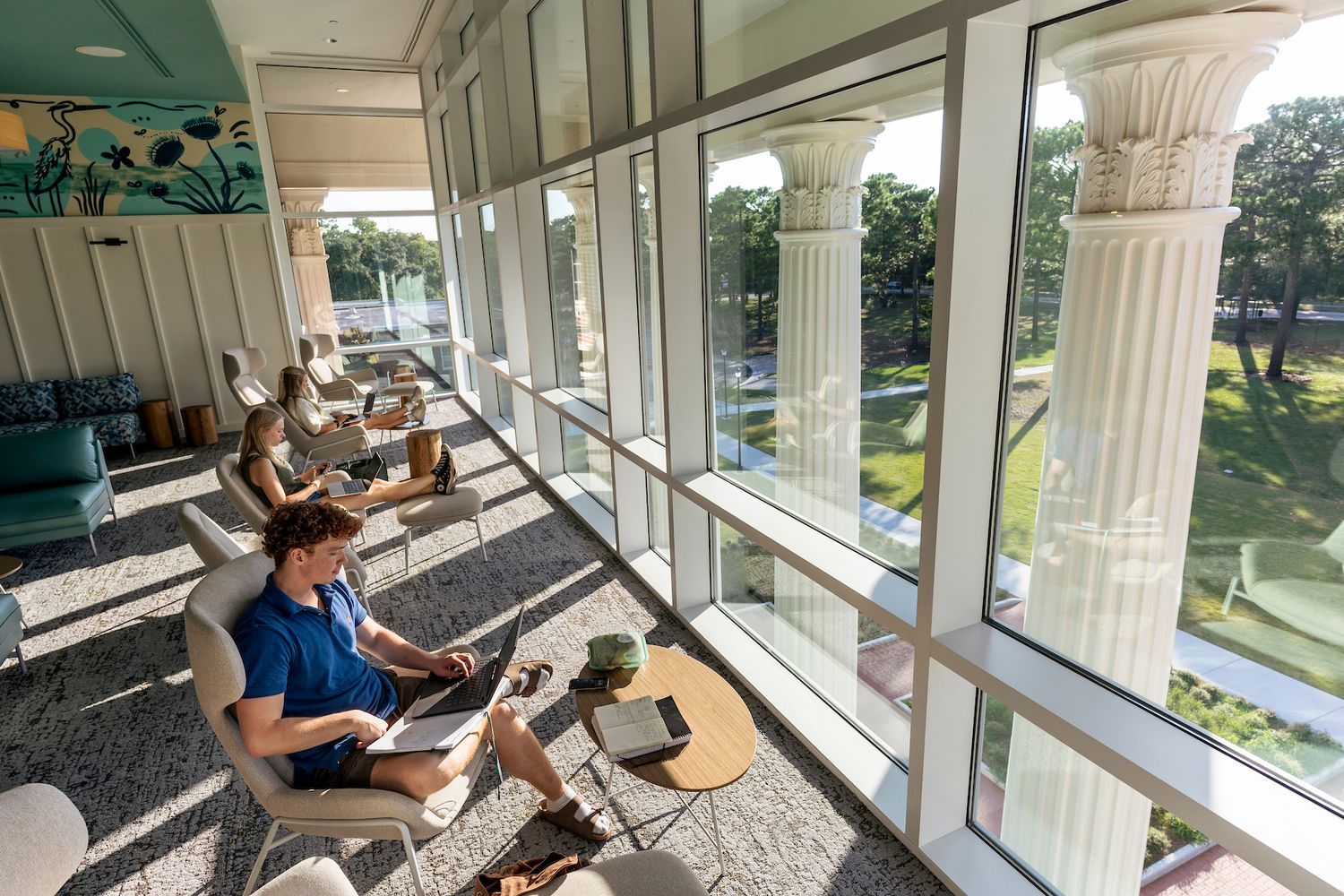 Students sit in The Lookout in Discovery Hall