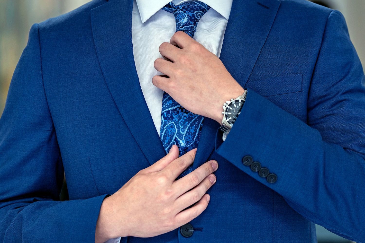 student in suit and tie