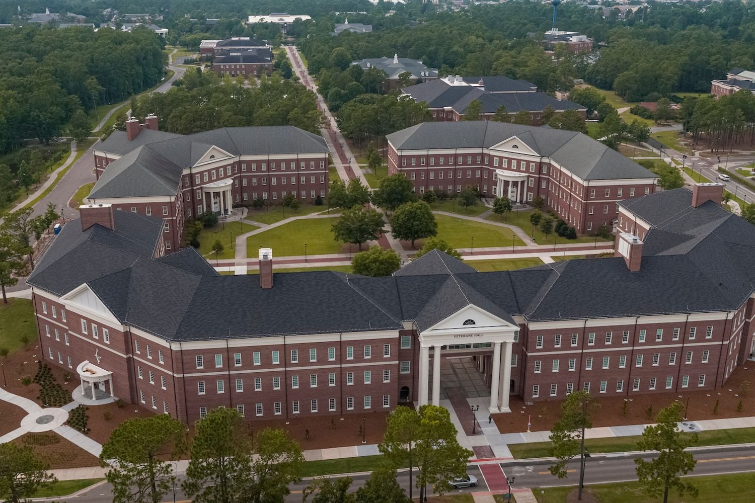 Veterans Hall, McNeill Hall and the Psychology lab building form the Health and Human Services Quad at the end of chancellor's walk.