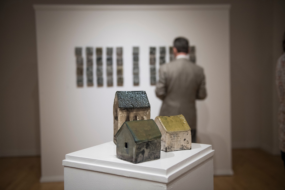 Three ceramic houses made for an art exhibit.