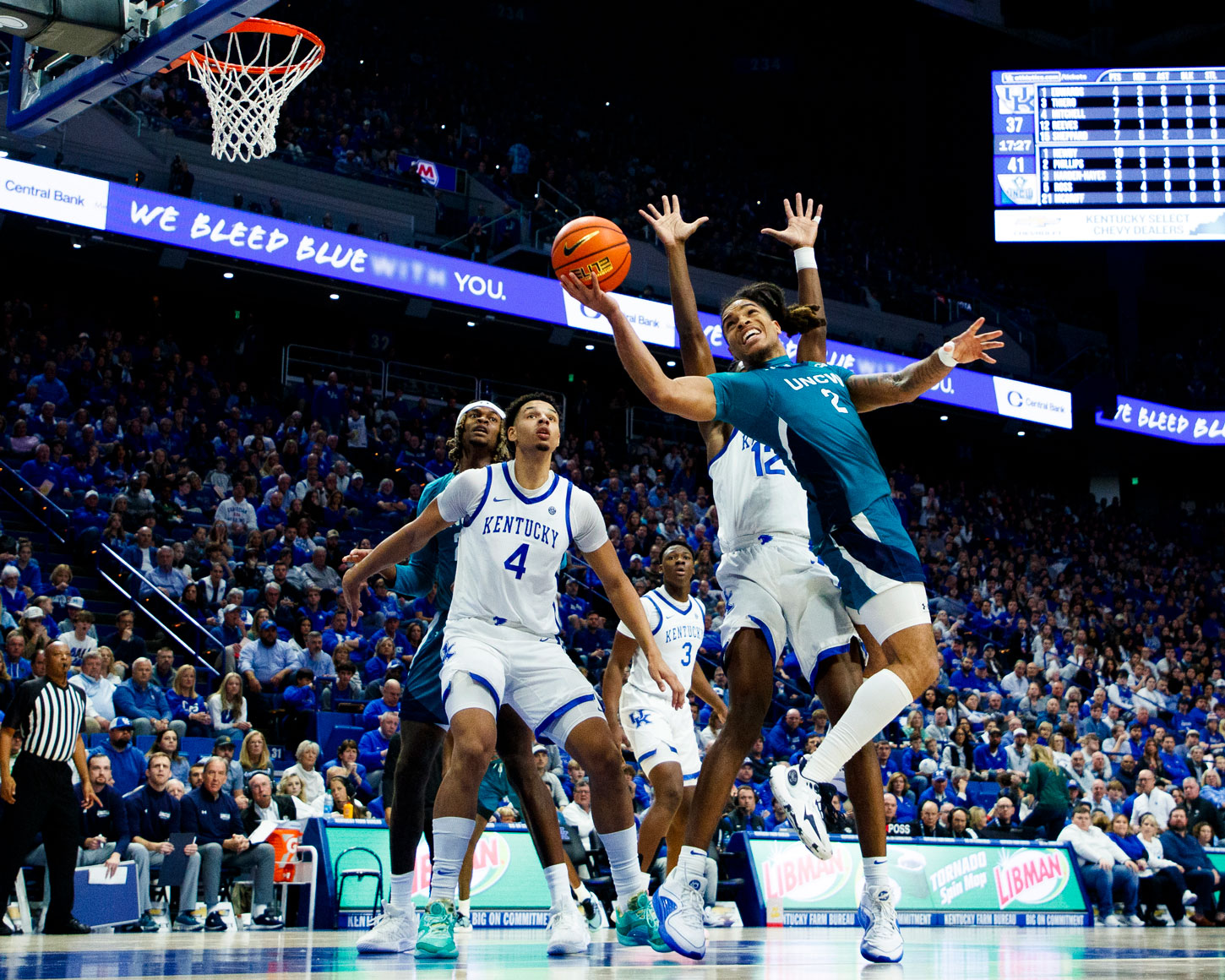 UNCW player Phillips makes an amazing shot during the game against Kentucky on Dec. 2
