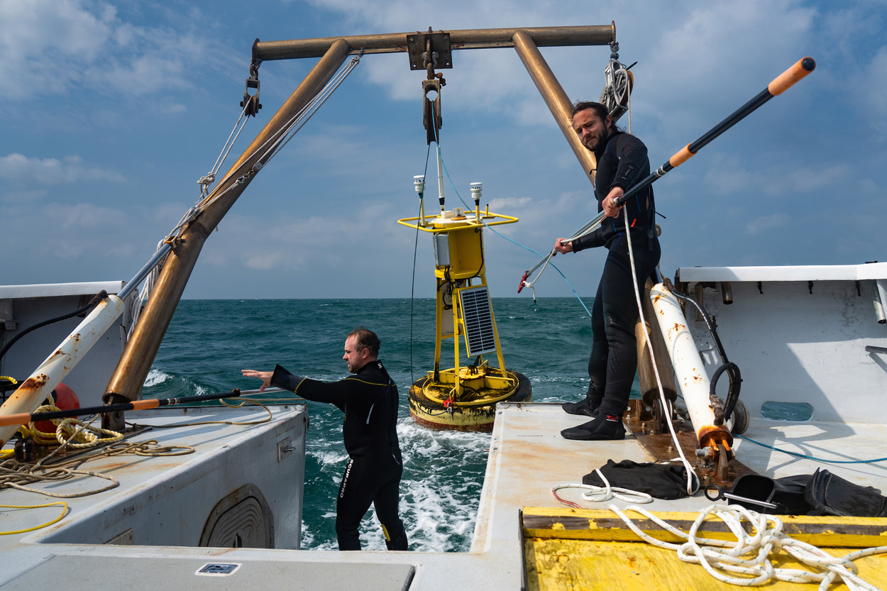 UNCW's Coastal Ocean Research and Monitoring Program team is busy ensuring its buoys and systems are ready to provide critical information on storms in the Atlantic Ocean.