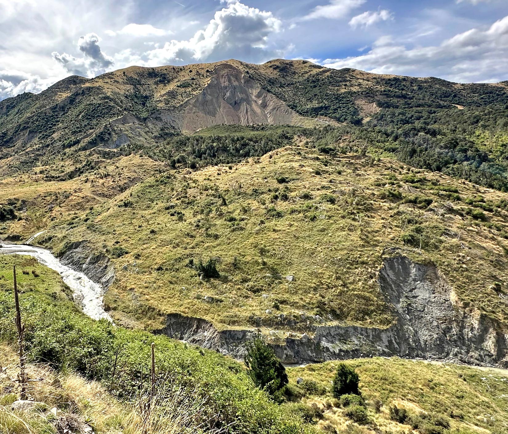 The Cascadia Region Earthquake Science Center (CRESCENT) project includes researchers from 16 institutions. Pictured: landslide scar in Oregon; Photo Credit: Ben Leschinsky 