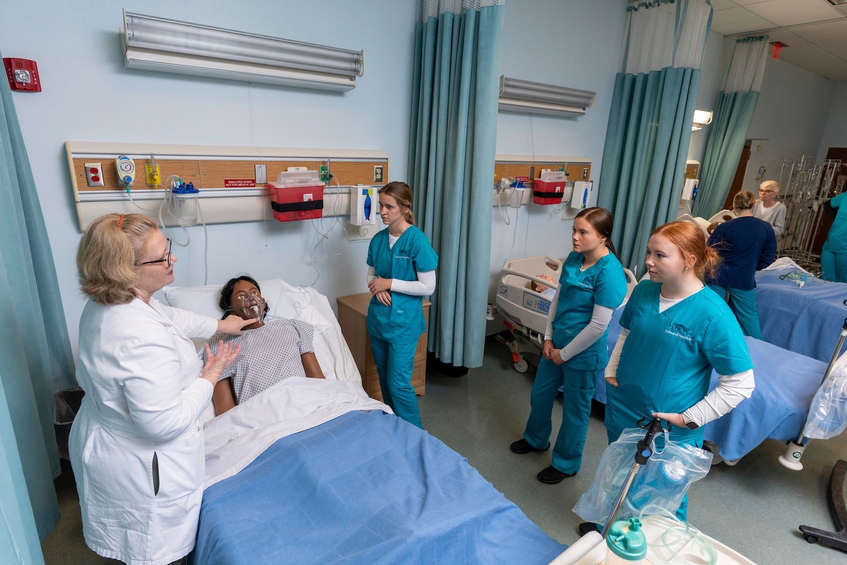 Nursing students work in the simulation lab in McNeill Hall on the campus of UNCW.
