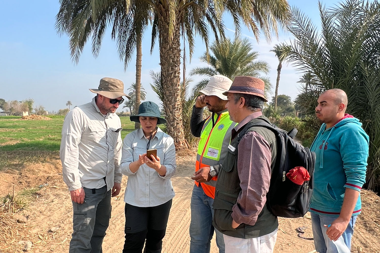Eman Ghoneim and colleagues in the field