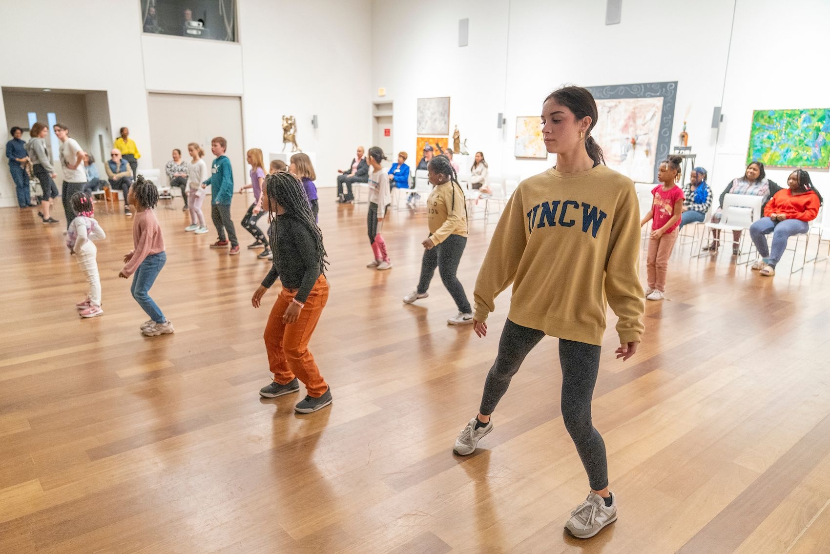 UNCW dance student Gabriella Billotti participates in the JUST US resiliency project at the Cameron Art Museum. 