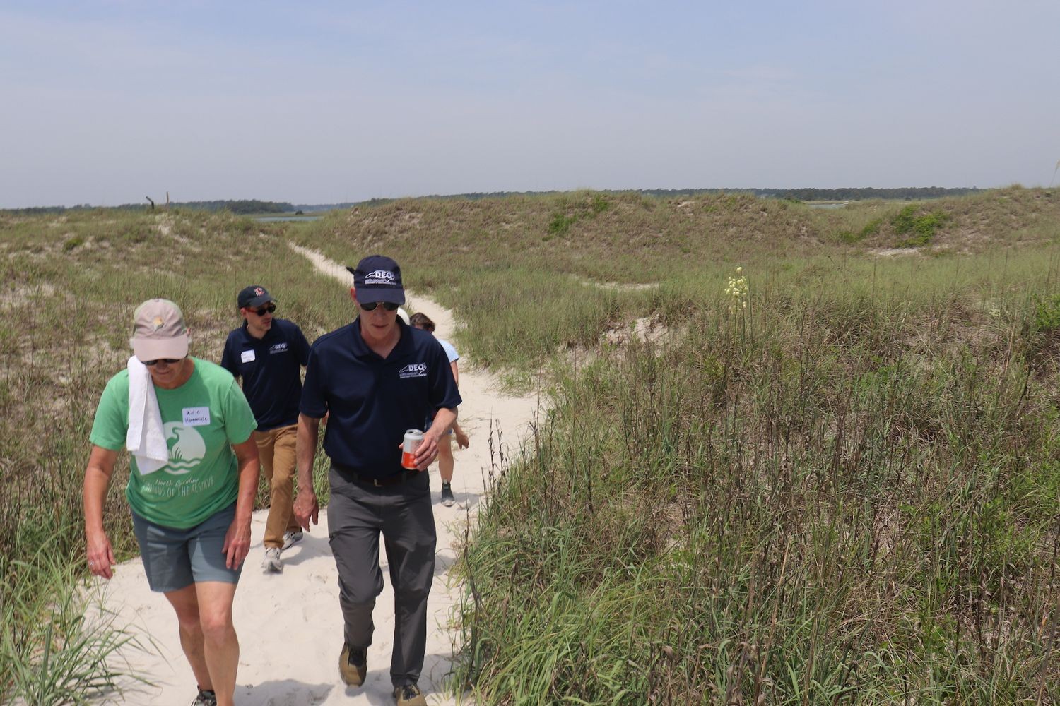 State and local leaders tour Masonboro Island Reserve on May 16, 2025, as part of the “Discover the N.C. Coastal Reserve” tour.