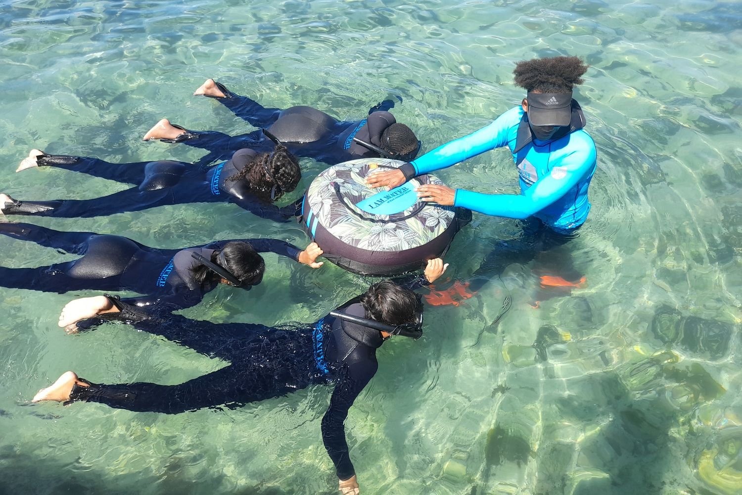 Middle school students experience a guided snorkel adventure during an I AM WATER Ocean Guardians Workshop.