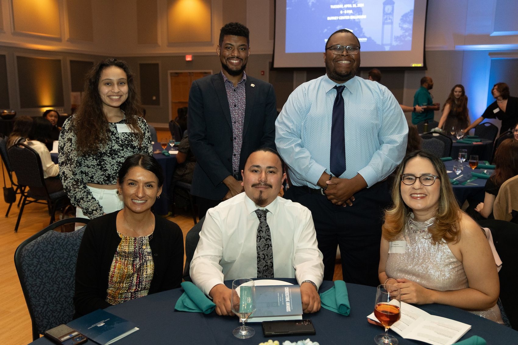 Noemi Meza (second row, far left) a nursing major with a clinical research minor, has been named as a recipient of the UNC Wilmington Cornerstone Award.