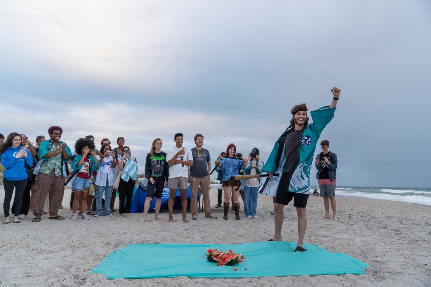 UNCW students watch watermelon smashing at a moon-viewing festival