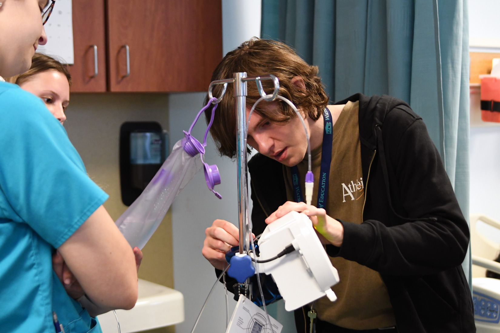 Student in nursing program getting hands on experience