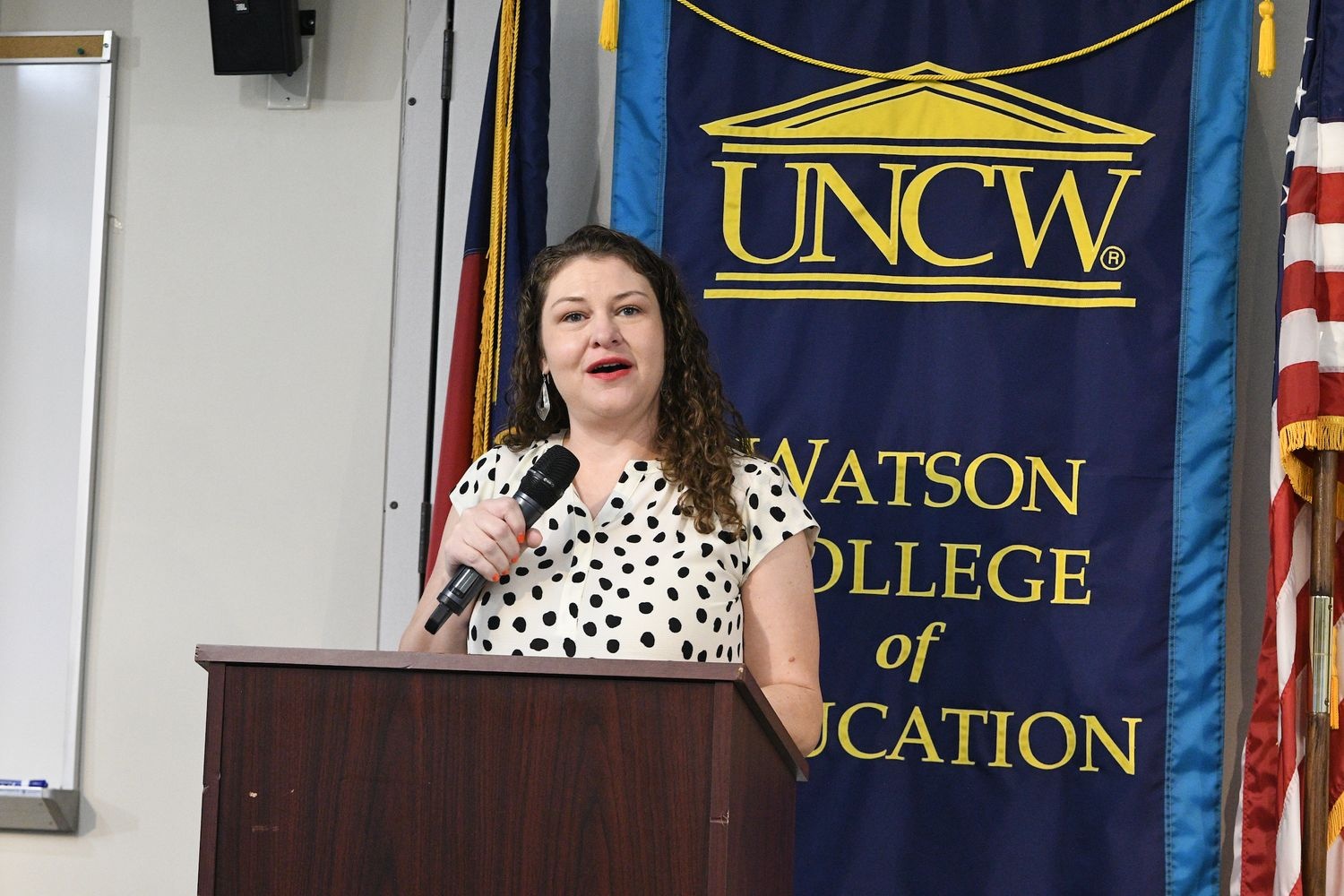 Dr. Symphony Oxendine greets the attendees at the Research Speaks event.