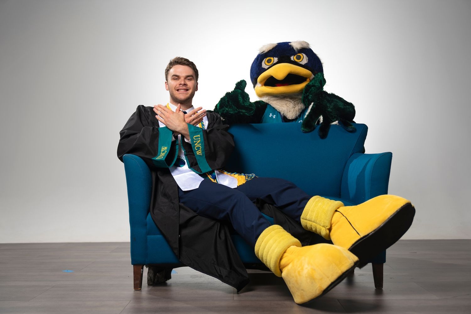 Reece Braswell ’26 reveals his secret role as UNCW's mascot, Sammy C. Hawk.