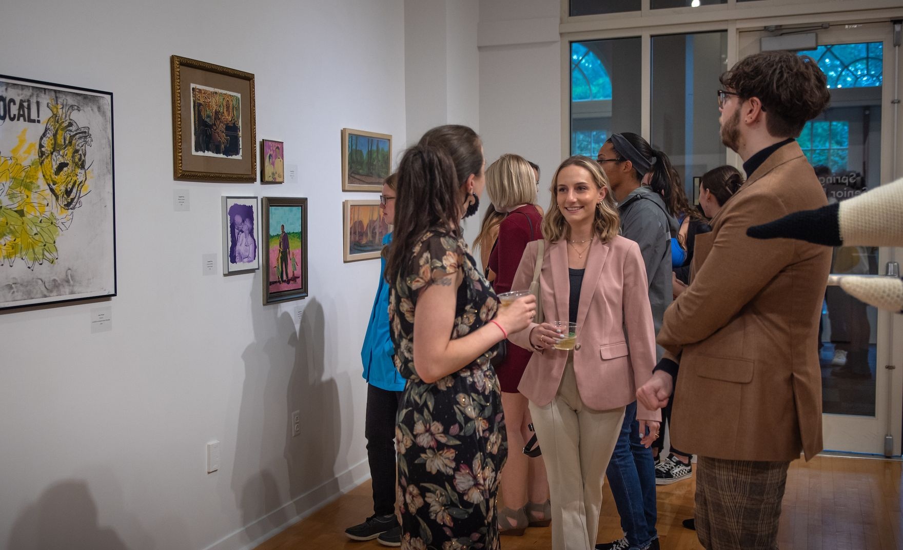 Attendees at an art show